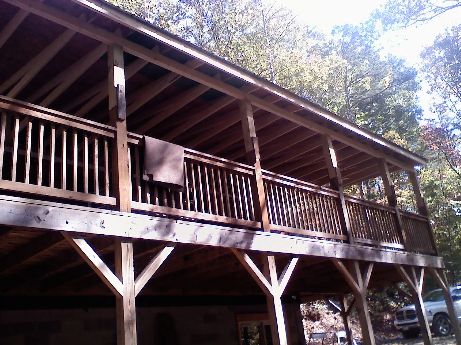 Timber framing under a new elevated porch and deck — Roof Leak Repair in Oneonta by Roofing Brothers